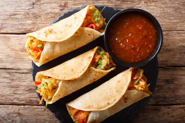 istock Indian veg spring roll stuffed with various vegetables close-up. horizontal top view 1051064908