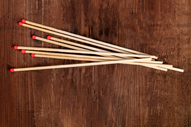 istock A handful of matches on a dark rustic background with copy space 1051065426