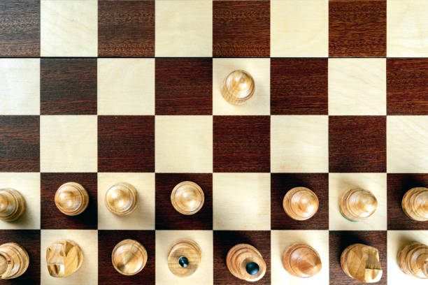istock A pawn doing the first move on a chessboard at the very beginning of the game 1051065442
