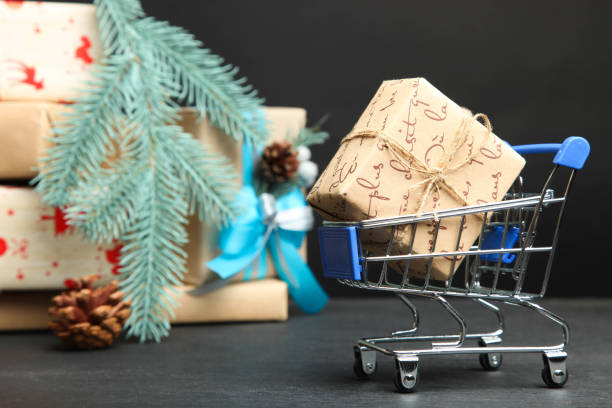 istock Trolley with Christmas gifts 1051067988