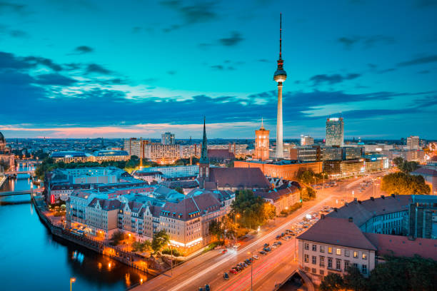 istock Berlin skyline with Spree river at sunset, Germany 1051077910