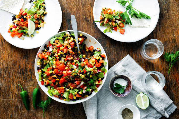 istock Mexican taco salad plate dark wooden table 1051077954