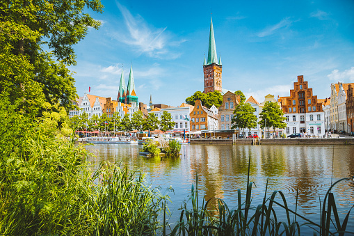 Classic panorama view of the historic city of Luebeck with famous Trave river in summer, Schleswig-Holstein, Germany