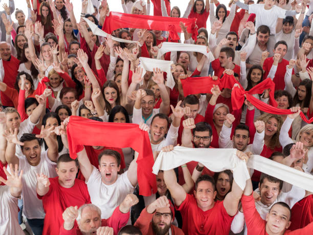 istock Above view of ecstatic  group of fans celebrating. 1051084692