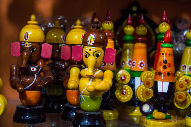 istock wooden objects dolls in shop 1051086260