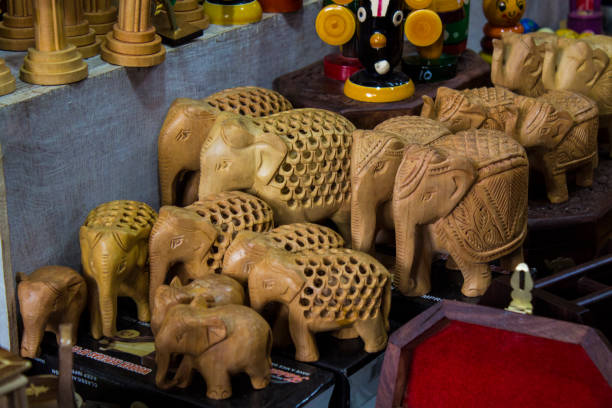istock wooden objects dolls in shop 1051089308