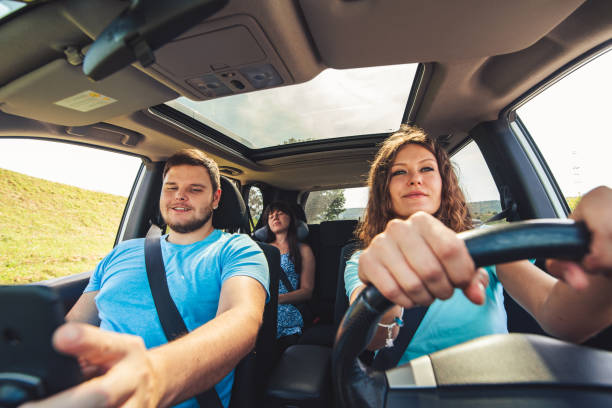 istock friends in car. road trip 1051089412