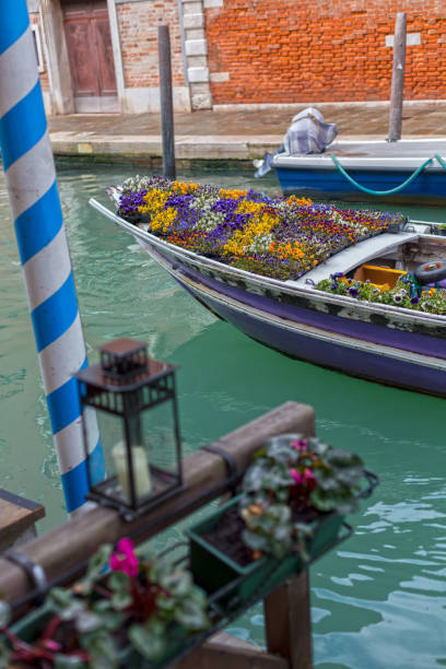 istock Boat Carrying Fresh Flowers in Venice 1051095006