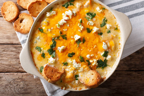 istock chicken buffalo dip with blue cheese and greens close-up in a baking dish. Horizontal top view 1051095472