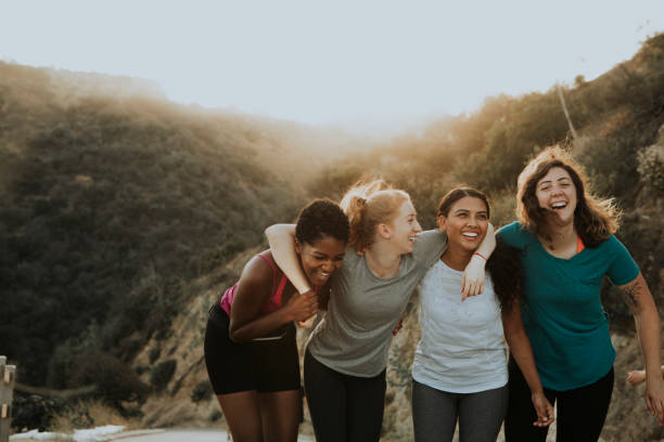 Friends hiking through the hills of Los Angeles Friends hiking through the hills of Los Angeles woman lifestyle stock pictures, royalty-free photos & images