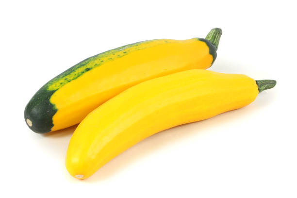 istock Zucchini and yellow squash isolated on white background 1051103290