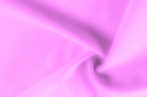 istock Soft focus. texture, pattern. Fabric of pink shades. For an elegant and modern look, bring your room to life with this light texture polyester! Although it has a luminous textured look, 1051106890