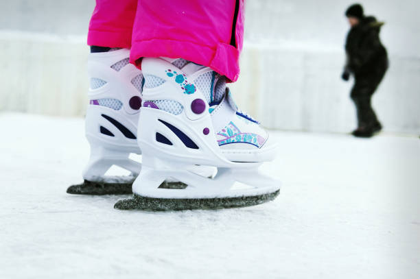 istock Toddler girl learning how to ice skate 1051110100