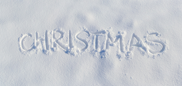 Panorama word Christmas imprint on pure frosty snow photo