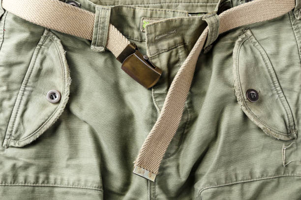 istock pants khaki belt. well visible fabric texture. 1051115290