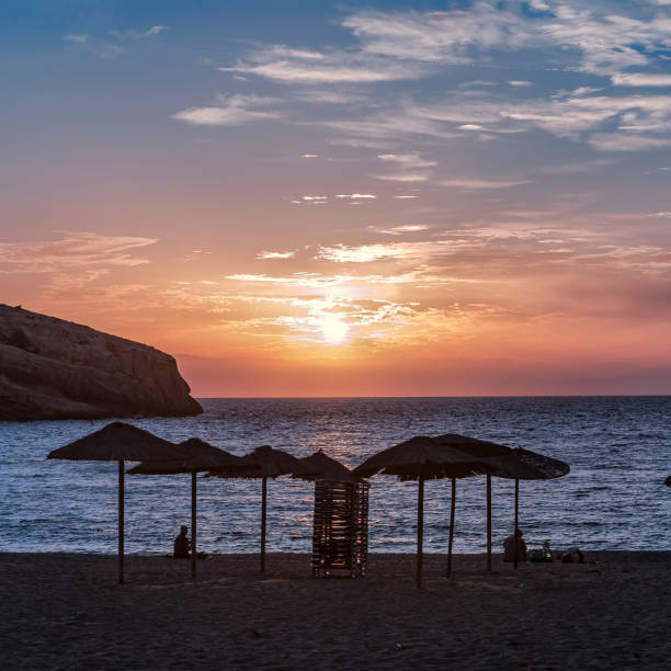 istock Sunset at Matala bay, South Crete, Greece 1051115958