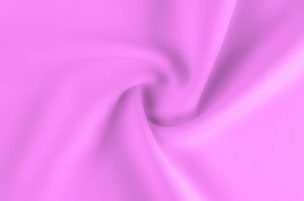 istock Soft focus. texture, pattern. Fabric of pink shades. For an elegant and modern look, bring your room to life with this light texture polyester! Although it has a luminous textured look, 1051118320