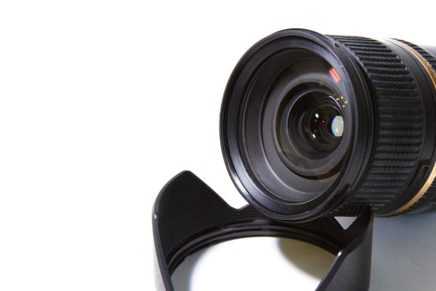 istock Lens from a professional SLR camera with a blend on a white background. 1051126910