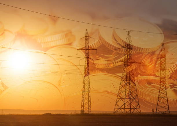 istock High-voltage power transmission line. Energy pillars. At sunset, 1051131042