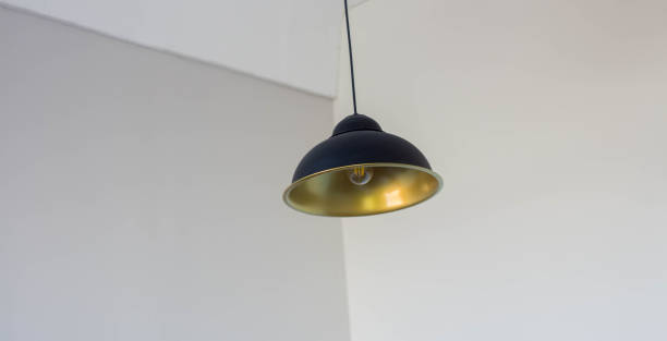 istock a gold chandelier on a white ceiling 1051132164