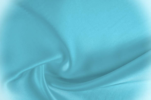 istock texture fabric silk blue Stunningly glowing, this Trooper Blue Silk Charmeuse is not to be missed! Perfect for your design let her shining face catch the light just as his liquid drape falls with ease 1051135690