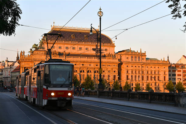 Prague national theatre building, monument,architecture,tramway,public transportation, city life.