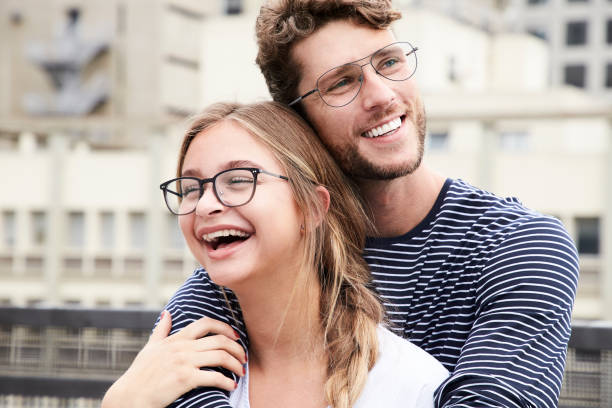 Laughing couple in specs