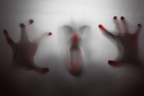 Scary clown trapped Scary clown trapped murderer photos stock pictures, royalty-free photos & images