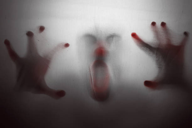 Scary clown trapped Scary clown trapped evil joker silhouette stock pictures, royalty-free photos & images