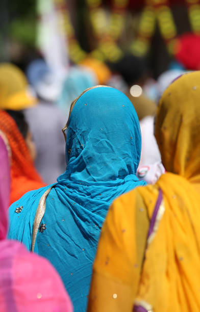 istock sikh young woman with colourful clothes 1051147106