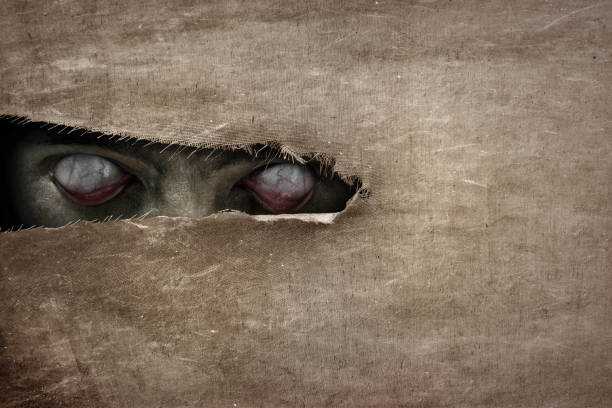 Devil eyes peeking Devil eyes peeking peeking photos stock pictures, royalty-free photos & images