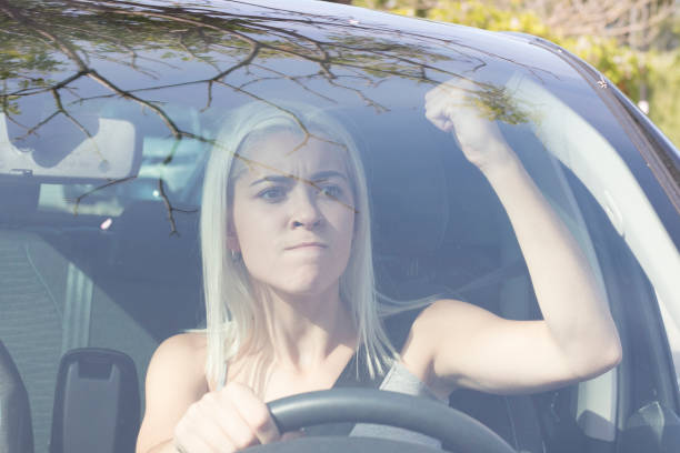 istock Young girl driving a car 1051155434