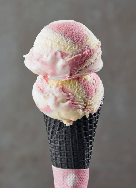 istock Ice cream balls in black waffle cone 1051161778