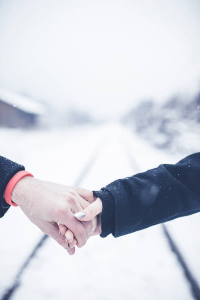istock Couple walking on railroad 1051162148