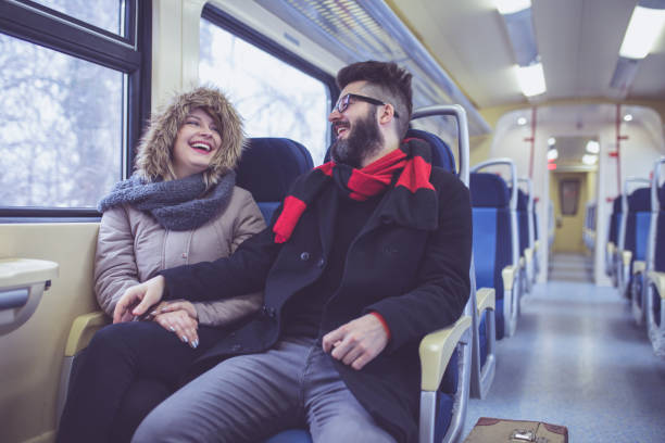 istock Happy couple traveling by train 1051164778