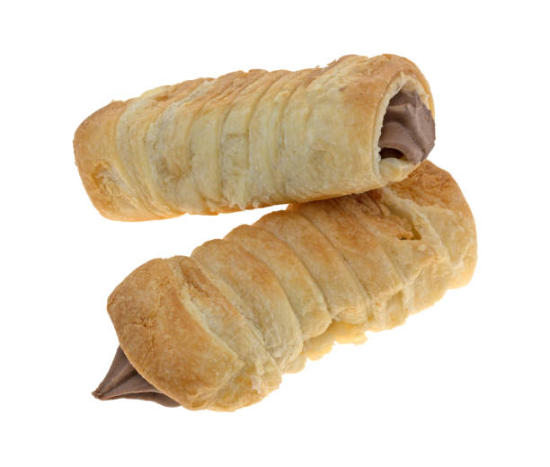 istock Chocolate creme horns on a white background 1051169766
