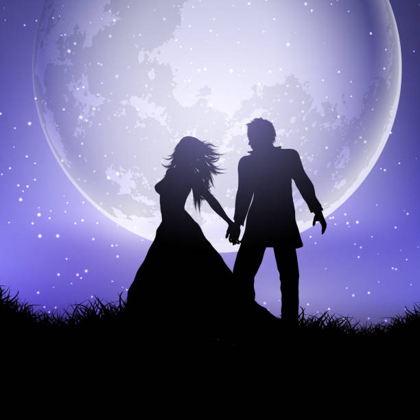 istock Silhouette of wedding couple against a moonlit sky 1051172042