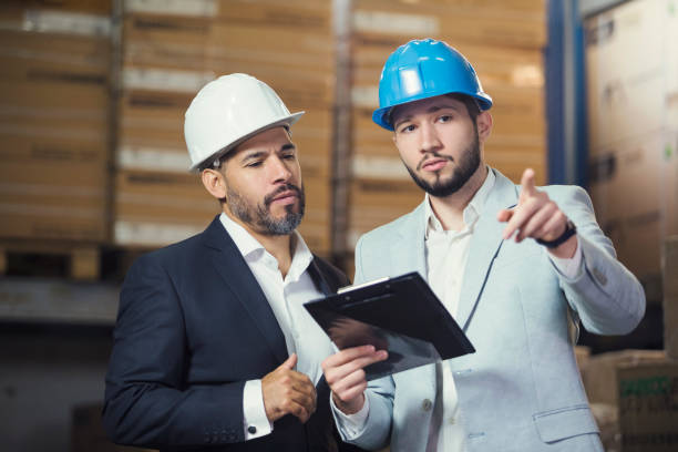 istock Business people in warehouse 1051172086