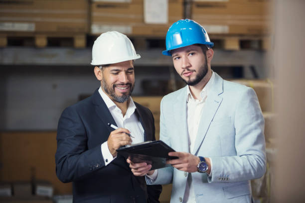 istock Business people in warehouse 1051172648