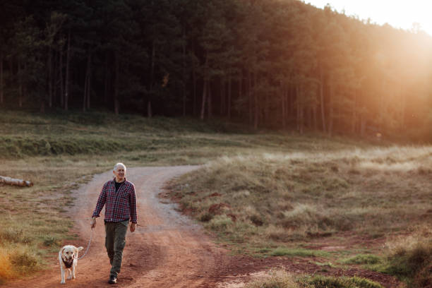 Senior Man Walking his Dog
