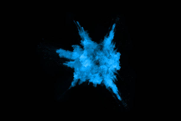istock Blue powder explosion on black background. Colored cloud. Colorful dust explode. Paint Holi. 1051181594