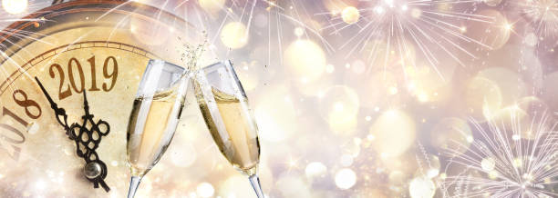istock New Year 2019 - Toast With Champagne And Clock 1051182440