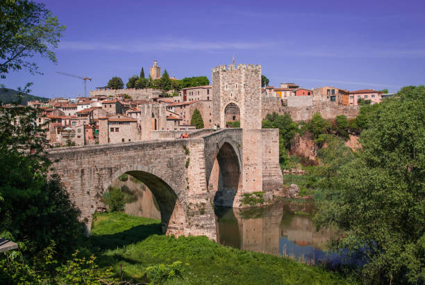 istock Medieval bridge over river El Fluvia near Besalu, Spain 1051191496