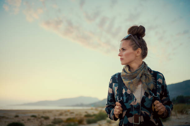 istock young woman looking aside 1051197384
