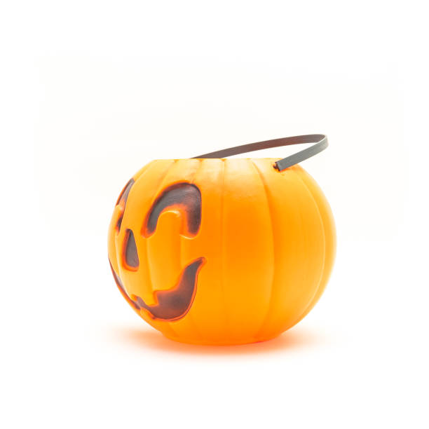 istock Top view plastic Halloween pumpkin pail basket isolated on white 1051201796