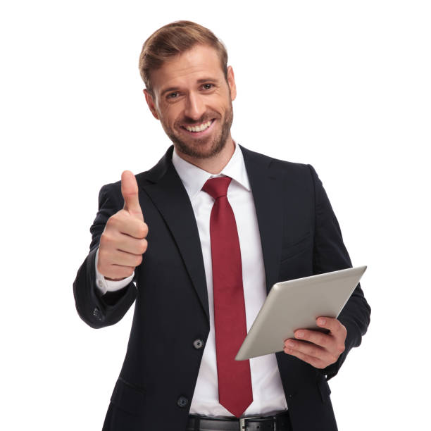 portrait of smiling businessman holding tablet and making ok sign - necktie isolated clothing white imagens e fotografias de stock