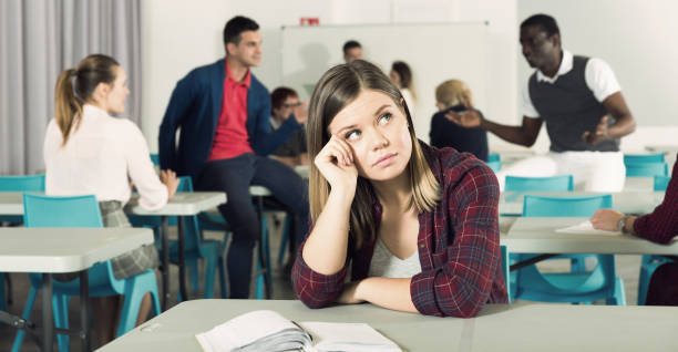 istock Upset girl in auditorium 1051202570
