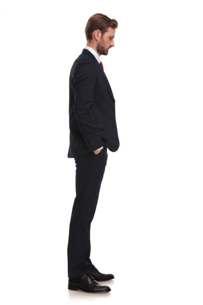 istock businessman waiting in line and looking down at something 1051205478