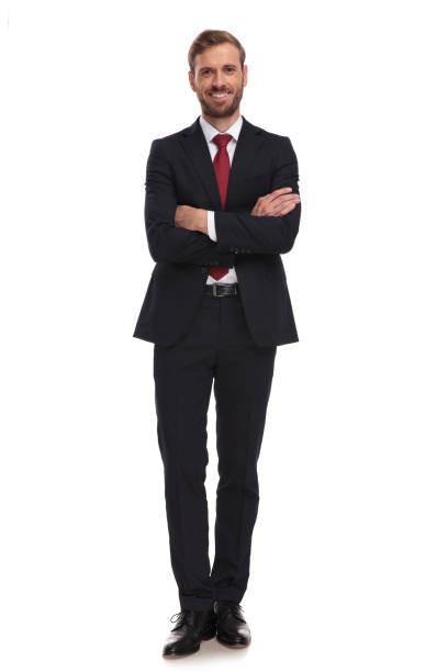 confident businessman standing on white background with arms folded - businessman business arms crossed business person imagens e fotografias de stock