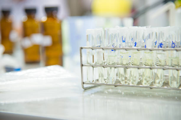 istock Blurred test tube in white laboratory concept. 1051210670